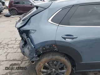2022 Mazda CX-30 S Carbon Edition with VIN 3MVDMBCL0NM456154, listed as a IAAI auction lot 42153202 with 40,372 mi miles and . Bid and sale history available at DreamBid. Image 6.