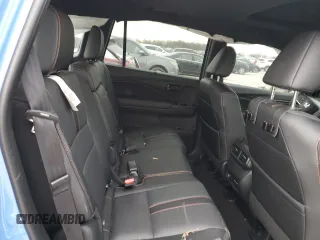 2025 Honda Passport TrailSport z VIN 5FNYF8H65SB009838, wystawiony jako Copart lot #87318814 z przebiegiem 2222 mil mil oraz Szkody całkowita. Historia ofert i sprzedaży dostępna na DreamBid. Obrazek 11.