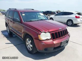 2009 Jeep Grand Cherokee Laredo with VIN 1J8GS48K39C521160, listed as a IAAI auction lot 42039577 with 262,829 mi miles. Bid and sale history available at carsss.com. Image 1.