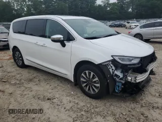 2023 Chrysler Pacifica Hybrid Limited with VIN 2C4RC1S70PR543587, listed as a Copart auction lot 60439795 with 11,558 mi miles and Salvage title. Bid and sale history available at DreamBid. Image 4.