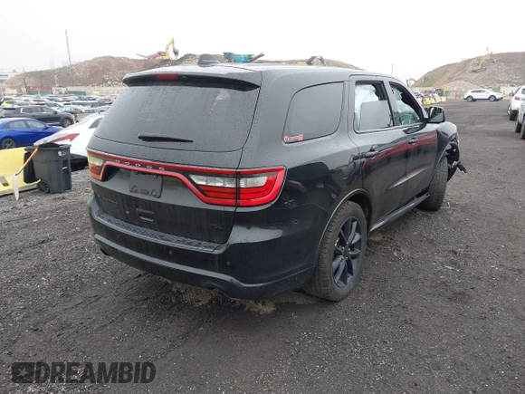 2017 Dodge Durango R/T with VIN 1C4SDJCTXHC878876, listed as a IAAI auction lot 42175360 with 61,323 mi miles and . Bid and sale history available at carsss.com. Image 4.