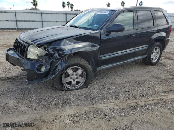 2007 Jeep Grand Cherokee Laredo with VIN 1J8HS48P37C594980, listed as a Copart auction lot 74819394 with 105,904 mi miles and Salvage Title. Bid and sale history available at carsss.com. Image 1.