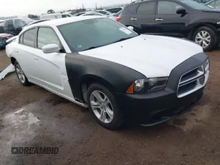 2013 Dodge Charger SE with VIN 2C3CDXBG1DH742921, listed as a IAAI auction lot 41765001 with 196,783 mi miles and . Bid and sale history available at DreamBid. Image 1.