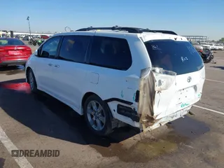 2014 Toyota Sienna SE with VIN 5TDXK3DCXES427950, listed as a IAAI auction lot 40394109 with 149,419 mi miles. Bid and sale history available at carsss.com. Image 3.