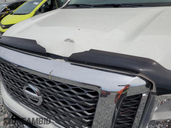 2017 Nissan Titan SV z VIN 1N6AA1EJ2HN570490, wystawiony jako Copart lot #50688785 z przebiegiem 122 817 mil mil oraz Szkoda całkowita • Salvage title. Historia ofert i sprzedaży dostępna na DreamBid. Obrazek 11.