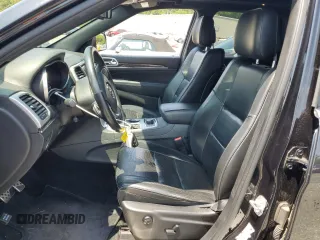 2016 Jeep Grand Cherokee Overland z VIN 1C4RJFCG5GC343864, wystawiony jako Copart lot #60892615 z przebiegiem 97 133 mil mil oraz Szkoda całkowita • Salvage title. Historia ofert i sprzedaży dostępna na DreamBid. Obrazek 7.