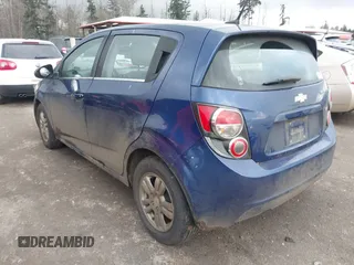 2013 Chevrolet Sonic LT with VIN 1G1JC6SB0D4205841, listed as a IAAI auction lot 41360755 with 137,150 mi miles. Bid and sale history available at carsss.com. Image 3.