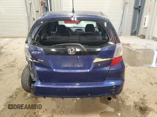 2009 Honda Fit with VIN JHMGE88229S044859, listed as a Copart auction lot 52742495 with 398,726 mi miles and Salvage Title. Bid and sale history available at carsss.com. Image 6.
