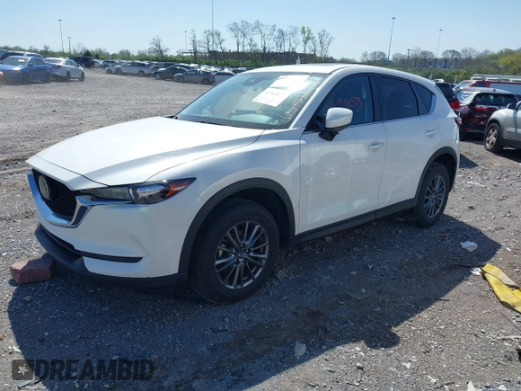2021 Mazda CX-5 Touring z VIN JM3KFBCM2M1395663, wystawiony jako IAAI lot #41948073 z przebiegiem 47 029 mil mil oraz . Historia ofert i sprzedaży dostępna na DreamBid. Obrazek 18.