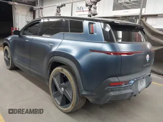 2023 Fisker Ocean One z VIN VCF1ZBU25PG003706, wystawiony jako IAAI lot #41906422 z przebiegiem Nie podano mil oraz . Historia ofert i sprzedaży dostępna na DreamBid. Obrazek 3.