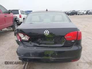 2014 Volkswagen Jetta Sedan SE w/Connectivity with VIN 3VWD07AJ3EM429815, listed as a IAAI auction lot 41288078 with 145,279 mi miles. Bid and sale history available at carsss.com. Image 16.