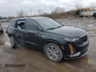 2022 Cadillac XT6 Premium Luxury z VIN 1GYKPDRS9NZ160942, wystawiony jako Copart lot #44256595 z przebiegiem 25 144 mil mil oraz Szkoda całkowita • Salvage title. Historia ofert i sprzedaży dostępna na DreamBid. Obrazek 4.