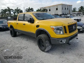 2016 Nissan Titan XD PRO-4X with VIN 1N6BA1F47GN509342, listed as a Copart auction lot 84259474 with 192,684 mi miles and Clean Title. Bid and sale history available at carsss.com. Image 4.