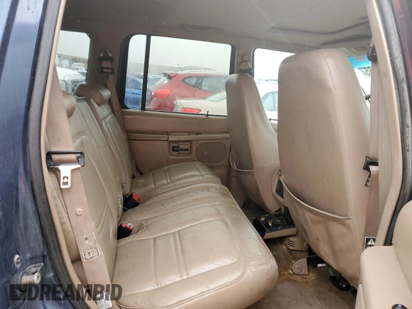 2000 Ford Explorer Eddie Bauer with VIN 1FMZU74E3YZA26797, listed as a Copart auction lot 53163865 with 297,314 mi miles and Clean title. Bid and sale history available at DreamBid. Image 10.