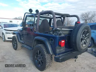 2001 Jeep Wrangler Sport with VIN 1J4FA49S41P334053, listed as a IAAI auction lot 41884967 with 158,258 mi miles. Bid and sale history available at carsss.com. Image 3.