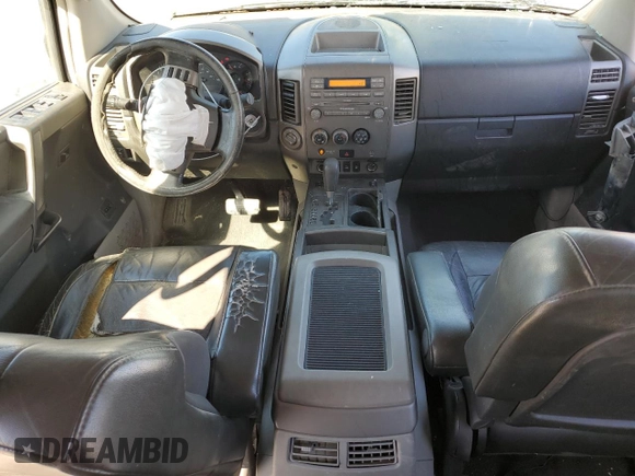2004 Nissan Titan LE with VIN 1N6AA07B24N575053, listed as a Copart auction lot 50370985 with 230,225 mi miles and Salvage title. Bid and sale history available at DreamBid. Image 8.