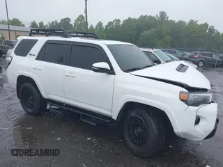 2024 Toyota 4Runner TRD Pro z VIN JTELU5JR9R6232047, wystawiony jako IAAI lot #42356997 z przebiegiem 23 256 mil mil oraz . Historia ofert i sprzedaży dostępna na DreamBid. Obrazek 1.