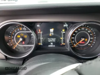 2020 Jeep Wrangler Willys z VIN 1C4GJXAG8LW285550, wystawiony jako Copart lot #57058815 z przebiegiem 24 388 mil mil oraz Szkoda całkowita • Salvage title. Historia ofert i sprzedaży dostępna na DreamBid. Obrazek 9.