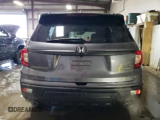 2021 Honda Passport Touring with VIN 5FNYF8H98MB012326, listed as a Copart auction lot 52165835 with 21,679 mi miles and Salvage Title. Bid and sale history available at carsss.com. Image 6.