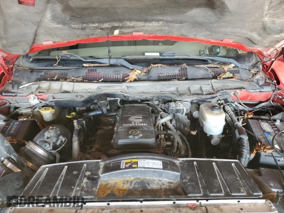 2012 Ram 2500 Big Horn z VIN 3C6UD5DL2CG259524, wystawiony jako Copart lot #60359255 z przebiegiem 174 698 mil mil oraz Szkoda całkowita • Salvage title. Historia ofert i sprzedaży dostępna na DreamBid. Obrazek 11.