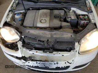 2008 Volkswagen Jetta SE z VIN 3VWRM71K48M168962, wystawiony jako Copart lot #61014415 z przebiegiem 165 679 mil mil oraz Nie do naprawy • Non repairable. Historia ofert i sprzedaży dostępna na DreamBid. Obrazek 11.