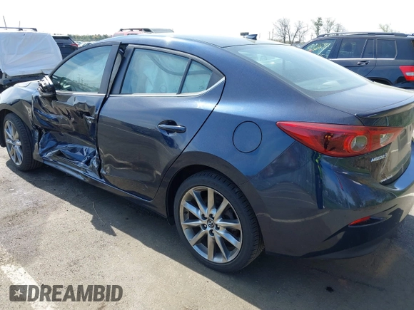 2018 Mazda 3 Grand Touring with VIN 3MZBN1W36JM213063, listed as a IAAI auction lot 42102460 with 49,180 mi miles and . Bid and sale history available at DreamBid. Image 3.