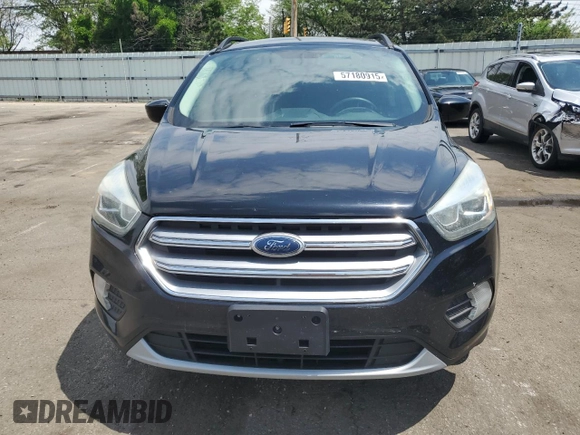2017 Ford Escape SE z VIN 1FMCU0GD5HUA47616, wystawiony jako Copart lot #57180915 z przebiegiem 193 358 mil mil oraz Czysty tytuł • Clean title. Historia ofert i sprzedaży dostępna na DreamBid. Obrazek 5.