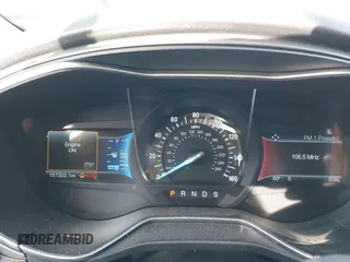 2015 Ford Fusion Titanium with VIN 3FA6P0K92FR274994, listed as a IAAI auction lot 41402325 with 157,332 mi miles. Bid and sale history available at carsss.com. Image 16.