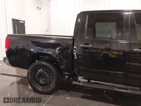 2015 Nissan Titan SV z VIN 1N6AA0EC6FN502962, wystawiony jako IAAI lot #41358935 z przebiegiem 102 204 mil mil oraz . Historia ofert i sprzedaży dostępna na DreamBid. Obrazek 6.