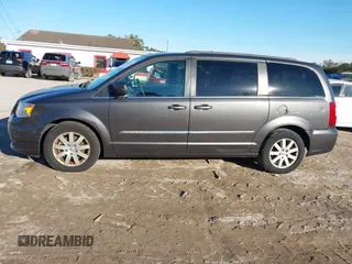 2016 Chrysler Town & Country Touring with VIN 2C4RC1BG6GR245495, listed as a IAAI auction lot 41410233 with 143,348 mi miles and . Bid and sale history available at DreamBid. Image 14.