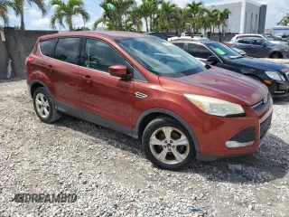 2014 Ford Escape SE with VIN 1FMCU0GX9EUD77491, listed as a Copart auction lot 51484745 with 90,511 mi miles and Clean Title. Bid and sale history available at DreamBid. Image 4.
