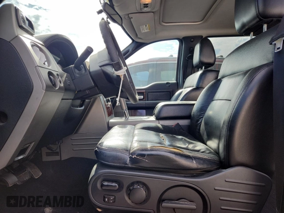 2005 Ford F-150 XLT with VIN 1FTPW14525FB75086, listed as a Copart auction lot 62744005 with 210,245 mi miles and Salvage title. Bid and sale history available at DreamBid. Image 7.