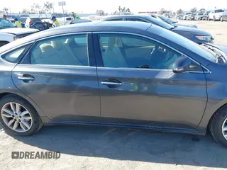 2015 Toyota Avalon Limited with VIN 4T1BK1EB3FU149678, listed as a IAAI auction lot 41372504 with 108,776 mi miles and . Bid and sale history available at DreamBid. Image 14.