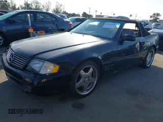 2001 Mercedes-Benz SL-Class with VIN WDBFA68F81F197287, listed as a IAAI auction lot 41442362 with 127,628 mi miles. Bid and sale history available at carsss.com. Image 2.