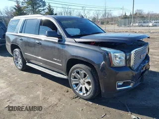 2016 GMC Yukon Denali with VIN 1GKS2CKJ0GR252965, listed as a IAAI auction lot 41628897 with 109,828 mi miles. Bid and sale history available at carsss.com. Image 1.