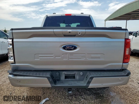 2023 Ford F-150 XL with VIN 1FTEW1C57PFC27842, listed as a Copart auction lot 59906015 with 43,495 mi miles and Salvage title. Bid and sale history available at DreamBid. Image 6.