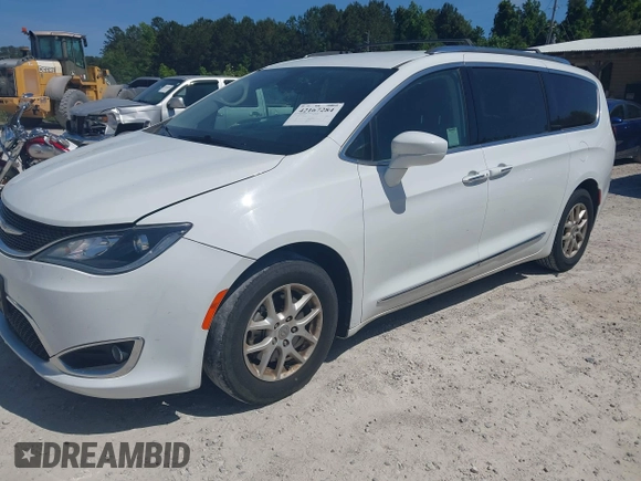 2020 Chrysler Pacifica Touring L z VIN 2C4RC1BG6LR276742, wystawiony jako IAAI lot #42167284 z przebiegiem 123 668 mil mil oraz . Historia ofert i sprzedaży dostępna na DreamBid. Obrazek 17.