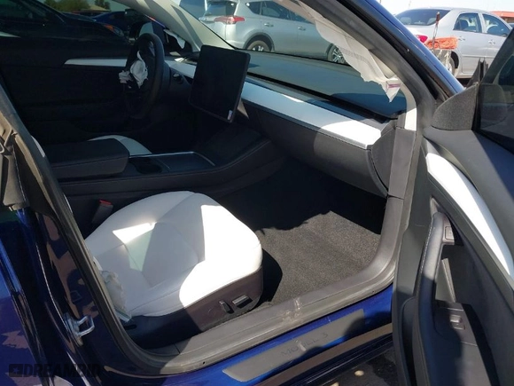 2022 Tesla Model 3 Performance with VIN 5YJ3E1EC4NF347055, listed as a IAAI auction lot 41713504 with 38,266 mi miles. Bid and sale history available at carsss.com. Image 5.