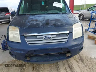 2011 Ford Transit Connect XLT with VIN NM0KS9BN2BT070324, listed as a IAAI auction lot 42511234 with 297,422 mi miles and . Bid and sale history available at DreamBid. Image 6.