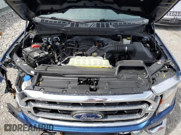 2022 Ford F-150 XL z VIN 1FTMF1C56NKD01221, wystawiony jako Copart lot #69941234 z przebiegiem 14 767 mil mil oraz Szkoda całkowita • Salvage title. Historia ofert i sprzedaży dostępna na DreamBid. Obrazek 11.