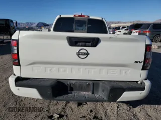 2022 Nissan Frontier SV z VIN 1N6ED1FJ6NN607236, wystawiony jako Copart lot #46663385 z przebiegiem 18 347 mil mil oraz Szkoda całkowita • Salvage title. Historia ofert i sprzedaży dostępna na DreamBid. Obrazek 6.