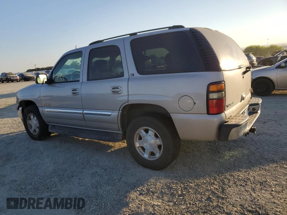 2005 GMC Yukon SLE with VIN 1GKEC13TX5J151930, listed as a Copart auction lot 73030094 with 216,351 mi miles and Clean Title. Bid and sale history available at carsss.com. Image 2.