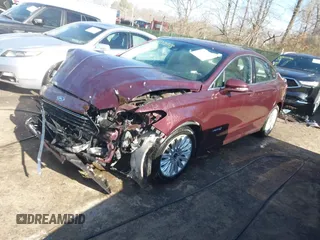 2013 Ford Fusion SE Hybrid with VIN 3FA6P0LU8DR206943, listed as a IAAI auction lot 41822643 with 141,484 mi miles. Bid and sale history available at carsss.com. Image 2.