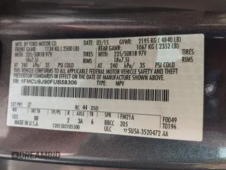 2015 Ford Escape Titanium with VIN 1FMCU9J90FUB58306, listed as a IAAI auction lot 41815151 with 136,835 mi miles. Bid and sale history available at carsss.com. Image 9.