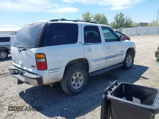 2001 GMC Yukon SLT z VIN 1GKEK13TX1R218315, wystawiony jako IAAI lot #42448454 z przebiegiem 290 859 mil mil oraz . Historia ofert i sprzedaży dostępna na DreamBid. Obrazek 4.