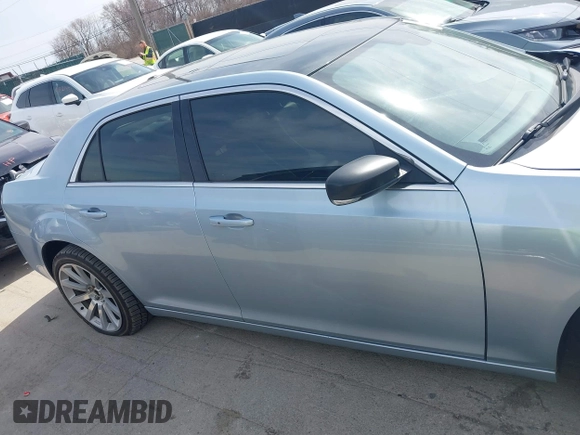 2013 Chrysler 300 with VIN 2C3CCAGT9DH590053, listed as a IAAI auction lot 41800253 with 136,596 mi miles. Bid and sale history available at carsss.com. Image 13.