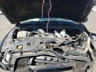 2018 Ram 1500 Rebel with VIN 1C6RR7YT1JS161619, listed as a Copart auction lot 60226061 with 49,567 mi miles and Salvage Title. Bid and sale history available at carsss.com. Image 7.