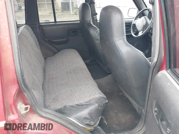 1999 Jeep Cherokee Sport with VIN 1J4FT68S1XL596443, listed as a IAAI auction lot 41767289 with 192,826 mi miles and . Bid and sale history available at DreamBid. Image 8.