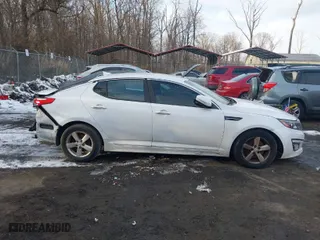 2015 Kia Optima LX with VIN 5XXGM4A74FG499110, listed as a IAAI auction lot 41303712 with 98,287 mi miles. Bid and sale history available at carsss.com. Image 13.