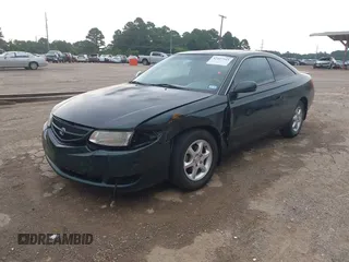 2001 Toyota Solara SE z VIN 2T1CG22P31C437576, wystawiony jako IAAI lot #42447345 z przebiegiem 164 366 mil mil oraz . Historia ofert i sprzedaży dostępna na DreamBid. Obrazek 2.